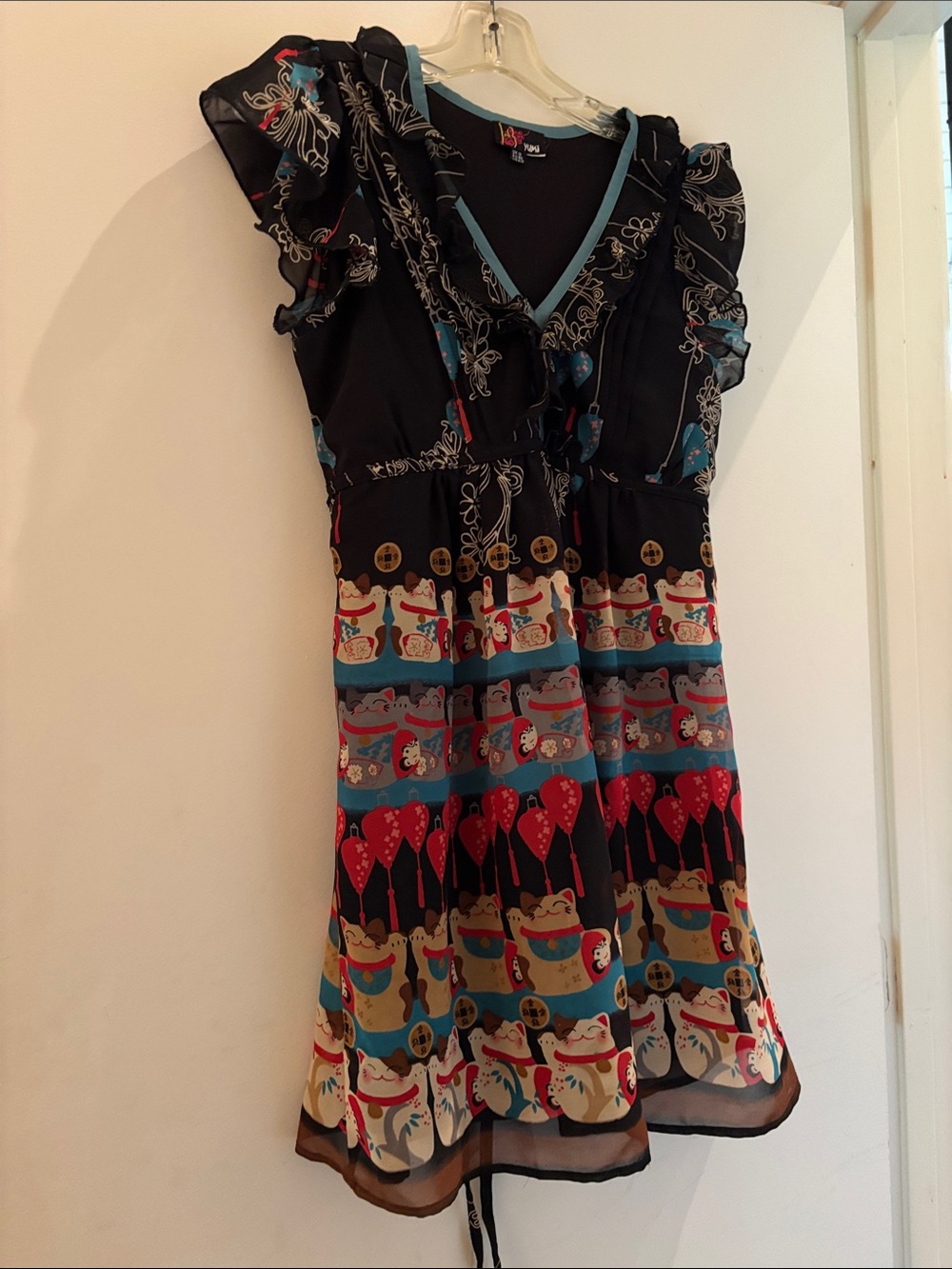 Yumi Black Mini Dress with Red and Teal Lucky Cat Print